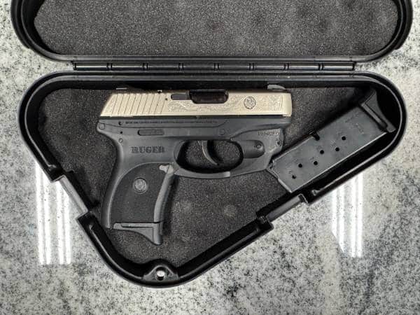 RUGER LC9 9MM 3.12" 7+1 2-MAGS NOT-ORIGINAL-CASE ENGRAVED SILVER/BLACK USED 321-76263